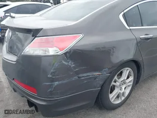 2009 Acura TL Tech with VIN 19UUA86519A014157, listed as a IAAI auction lot 42058423 with 201,403 mi miles. Bid and sale history available at carsss.com. Image 12.