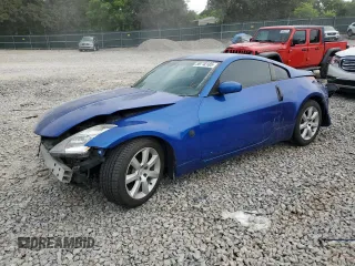 2003 Nissan 350Z Performance z VIN JN1AZ34D13T111803, wystawiony jako Copart lot #59712185 z przebiegiem 113 704 mil mil oraz Szkoda całkowita • Salvage title. Historia ofert i sprzedaży dostępna na DreamBid. Obrazek 1.