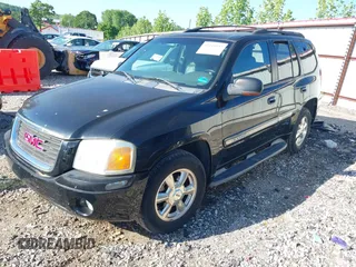 2002 GMC Envoy SLT z VIN 1GKDT13S322146884, wystawiony jako IAAI lot #42244937 z przebiegiem 203 633 mil mil oraz . Historia ofert i sprzedaży dostępna na DreamBid. Obrazek 2.