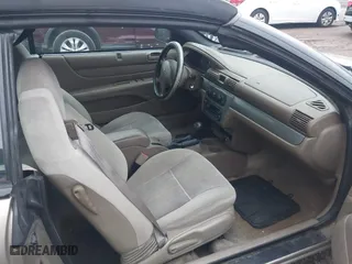 2004 Chrysler Sebring LXi with VIN 1C3EL55R94N406406, listed as a IAAI auction lot 40852693 with 167,981 mi miles. Bid and sale history available at carsss.com. Image 5.