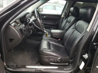 2009 Cadillac DTS Professional Limousine z VIN 1GEEK90Y89U550148, wystawiony jako Copart lot #79937134 z przebiegiem 25 996 mil mil oraz Szkody całkowita. Historia ofert i sprzedaży dostępna na DreamBid. Obrazek 7.