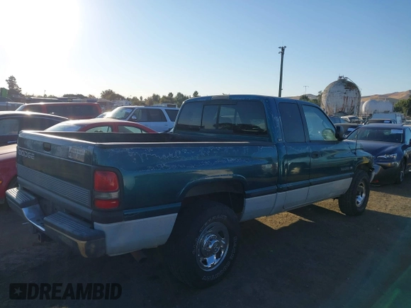 1999 Dodge Ram 2500 with VIN 3B7KC23Z5XG118959, listed as a IAAI auction lot 40484594 with 176,946 mi miles. Bid and sale history available at carsss.com. Image 4.