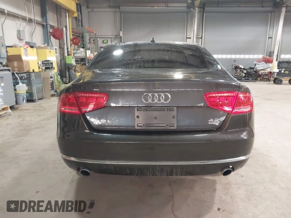 2012 Audi A8 z VIN WAURVAFD6CN014546, wystawiony jako IAAI lot #41357932 z przebiegiem 93 516 mil mil oraz . Historia ofert i sprzedaży dostępna na DreamBid. Obrazek 16.