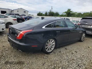2019 Jaguar XJ R-Sport with VIN SAJWJ1CD1K8W18574, listed as a Copart auction lot 65041445 with 101,072 mi miles and Clean title. Bid and sale history available at DreamBid. Image 3.