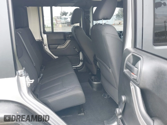 2018 Jeep Wrangler Unlimited Sport S with VIN 1C4BJWDG4JL861052, listed as a IAAI auction lot 42100517 with 43,907 mi miles and . Bid and sale history available at DreamBid. Image 8.