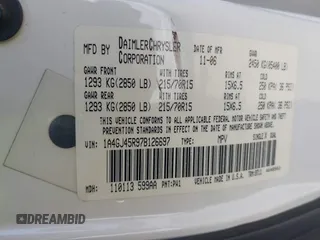 2007 Chrysler Town & Country with VIN 1A4GJ45R97B126697, listed as a IAAI auction lot 42180124 with 186,396 mi miles. Bid and sale history available at carsss.com. Image 9.