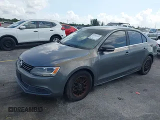 2013 Volkswagen Jetta SE with VIN 3VWDP7AJ1DM280251, listed as a IAAI auction lot 42391472 with 98,788 mi miles and . Bid and sale history available at DreamBid. Image 2.