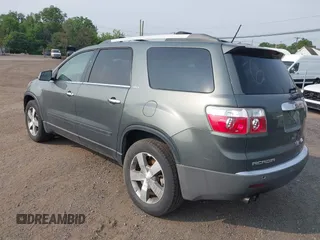 2011 GMC Acadia SLT1 z VIN 1GKKVRED6BJ212512, wystawiony jako IAAI lot #42472759 z przebiegiem 116 513 mil mil oraz . Historia ofert i sprzedaży dostępna na DreamBid. Obrazek 3.