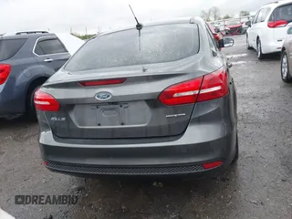 2015 Ford Focus SE with VIN 1FADP3F28FL219552, listed as a IAAI auction lot 41959648 with 128,590 mi miles. Bid and sale history available at carsss.com. Image 16.