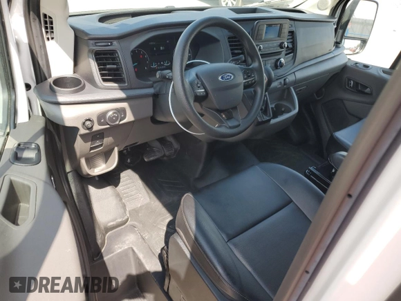 2023 Ford Transit Cargo with VIN 1FTBR2X88PKB38261, listed as a Copart auction lot 70617654 with 1,088 mi miles and Salvage Title. Bid and sale history available at DreamBid. Image 8.