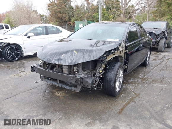2015 Toyota Camry XLE with VIN 4T1BF1FK9FU114582, listed as a IAAI auction lot 41801187 with 165,199 mi miles. Bid and sale history available at carsss.com. Image 6.