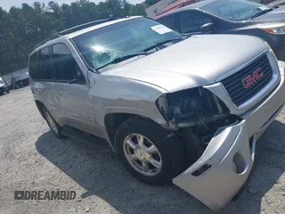 2004 GMC Envoy SLT with VIN 1GKDS13S742230325, listed as a IAAI auction lot 42385113 with 177,989 mi miles and . Bid and sale history available at DreamBid. Image 1.