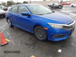 2017 Honda Civic LX z VIN 2HGFC2F57HH567105, wystawiony jako IAAI lot #41541026 z przebiegiem 122 554 mil mil oraz . Historia ofert i sprzedaży dostępna na DreamBid. Obrazek 1.