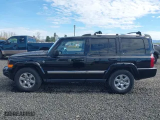 2006 Jeep Commander Limited with VIN 1J8HG58256C173210, listed as a IAAI auction lot 41809396 with 214,864 mi miles. Bid and sale history available at carsss.com. Image 14.