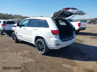 2018 Jeep Grand Cherokee Laredo E with VIN 1C4RJFAGXJC435658, listed as a IAAI auction lot 40659459 with 97,827 mi miles. Bid and sale history available at carsss.com. Image 3.