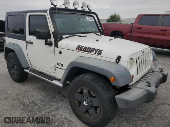2009 Jeep Wrangler X with VIN 1J4FA24139L716919, listed as a Copart auction lot 54626855 with 211,943 mi miles and Clean Title. Bid and sale history available at DreamBid. Image 4.
