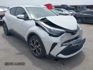 2022 Toyota C-HR XLE z VIN NMTKHMBX2NR144638, wystawiony jako IAAI lot #42063325 z przebiegiem 22 823 mil mil oraz . Historia ofert i sprzedaży dostępna na DreamBid. Obrazek 1.