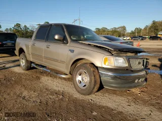 2001 Ford F-150 SuperCrew XLT with VIN 1FTRW07W31KA86300, listed as a Copart auction lot 57283434 with 129,416 mi miles and Salvage Title. Bid and sale history available at carsss.com. Image 4.