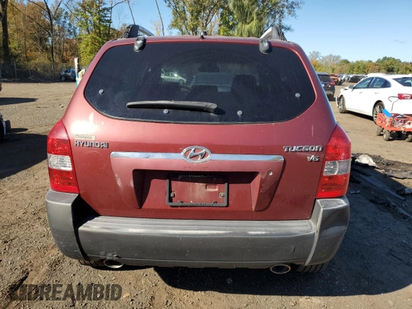 2005 Hyundai Tucson GLS with VIN KM8JN12D75U112964, listed as a Copart auction lot 75042354 with 77,827 mi miles and Salvage Title. Bid and sale history available at carsss.com. Image 6.