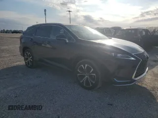 2021 Lexus RX 350L with VIN JTJHZKEA6M2021819, listed as a Copart auction lot 74559854 with 14,652 mi miles and Salvage title. Bid and sale history available at DreamBid. Image 4.