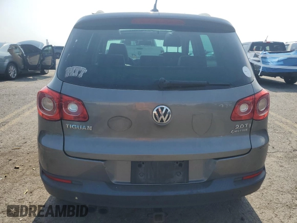 2010 Volkswagen Tiguan S with VIN WVGBV7AX5AW529484, listed as a Copart auction lot 62807895 with 135,197 mi miles and Salvage title. Bid and sale history available at DreamBid. Image 6.