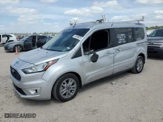2023 Ford Transit Connect Wagon XLT with VIN NM0GE9F22P1560777, listed as a Copart auction lot 49748675 with 50,563 mi miles and Salvage Title. Bid and sale history available at carsss.com. Image 1.