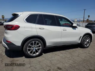 2019 BMW X5 xDrive40i with VIN 5UXCR6C52KLL35774, listed as a Copart auction lot 51802385 with 99,311 mi miles and Clean Title. Bid and sale history available at carsss.com. Image 3.