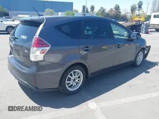 2015 Toyota Prius Two with VIN JTDZN3EUXFJ027926, listed as a IAAI auction lot 42036024 with 104,976 mi miles and . Bid and sale history available at DreamBid. Image 4.