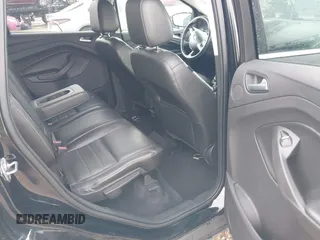 2016 Ford Escape Titanium with VIN 1FMCU0JX8GUA49619, listed as a IAAI auction lot 41743116 with 53,456 mi miles. Bid and sale history available at carsss.com. Image 8.