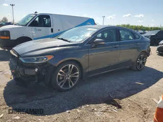 2019 Ford Fusion Titanium with VIN 3FA6P0D92KR186809, listed as a Copart auction lot 57946285 with 104,601 mi miles and Salvage title. Bid and sale history available at DreamBid. Image 1.