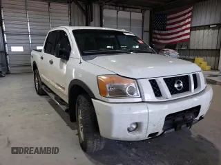 2010 Nissan Titan Pro-4X with VIN 1N6BA0EC3AN312601, listed as a Copart auction lot 52633455 with 161,260 mi miles and Salvage title. Bid and sale history available at DreamBid. Image 14.