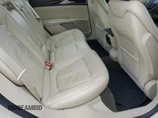2015 Lincoln MKZ с VIN 3LN6L2J95FR614718, выставлен на аукционе Copart как лот 63577165 с пробегом 89 322 миль миль и На запчасти • Non repairable. История ставок и продаж доступна на DreamBid. Изображение 10.