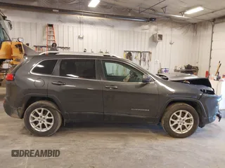 2016 Jeep Cherokee Latitude z VIN 1C4PJMCS6GW101471, wystawiony jako IAAI lot #41919576 z przebiegiem 113 492 mil mil oraz . Historia ofert i sprzedaży dostępna na DreamBid. Obrazek 13.