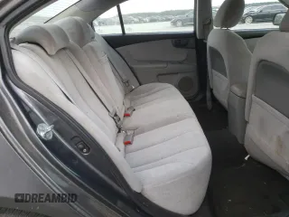 2009 Kia Optima LX z VIN KNAGE228695331919, wystawiony jako Copart lot #57804835 z przebiegiem 199 204 mil mil oraz Szkoda całkowita • Salvage title. Historia ofert i sprzedaży dostępna na DreamBid. Obrazek 10.