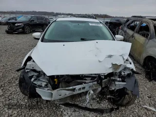 2016 Ford Focus SE with VIN 1FADP3F20GL346345, listed as a Copart auction lot 77115253 with 91,588 mi miles and Salvage Title. Bid and sale history available at DreamBid. Image 5.