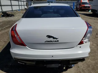 2016 Jaguar XJ Portfolio with VIN SAJWA2G70G8W01136, listed as a Copart auction lot 50120455 with 92,224 mi miles and Salvage title. Bid and sale history available at DreamBid. Image 6.
