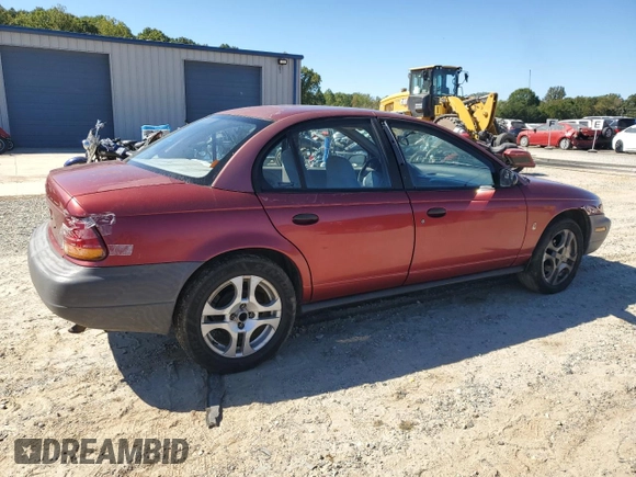 1998 Saturn SL z VIN 1G8ZH528XWZ144301, wystawiony jako Copart lot #75918414 z przebiegiem 219 256 mil mil oraz Szkoda całkowita • Salvage title. Historia ofert i sprzedaży dostępna na DreamBid. Obrazek 3.