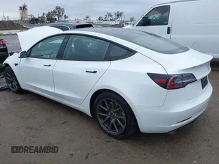 2023 Tesla Model 3 with VIN 5YJ3E1EA6PF432397, listed as a IAAI auction lot 41760895 with 15,692 mi miles and . Bid and sale history available at DreamBid. Image 3.