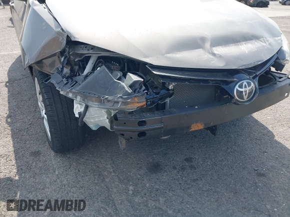 2018 Toyota Corolla L with VIN 5YFBURHE6JP774827, listed as a IAAI auction lot 42598086 with 29,400 mi miles and . Bid and sale history available at DreamBid. Image 6.