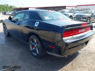 2014 Dodge Challenger SXT with VIN 2C3CDYAG7EH311556, listed as a IAAI auction lot 41868774 with 176,764 mi miles. Bid and sale history available at carsss.com. Image 3.