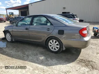 2003 Toyota Camry LE with VIN 4T1BE30K43U724778, listed as a Copart auction lot 53515605 with 176,568 mi miles and Salvage Title. Bid and sale history available at DreamBid. Image 2.