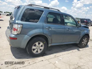 2010 Mercury Mariner with VIN 4M2CN9B70AKJ08597, listed as a Copart auction lot 63486595 with 113,207 mi miles and Salvage title. Bid and sale history available at DreamBid. Image 3.