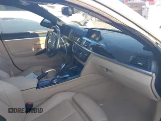 2016 BMW 4 Series 428i xDrive with VIN WBA4C9C54GG139275, listed as a IAAI auction lot 40828786 with 128,124 mi miles and . Bid and sale history available at carsss.com. Image 5.