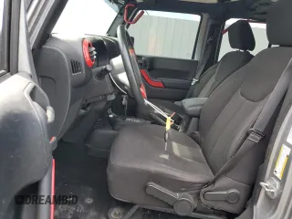 2014 Jeep Wrangler Unlimited Sport with VIN 1C4BJWDG3EL108151, listed as a Copart auction lot 49862315 with 104,417 mi miles and Salvage Title. Bid and sale history available at carsss.com. Image 7.
