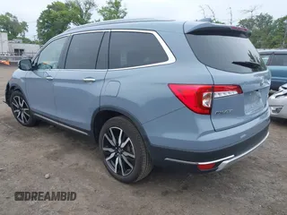2022 Honda Pilot Touring 7-Passenger with VIN 5FNYF6H68NB056077, listed as a IAAI auction lot 42357338 with 18,193 mi miles and . Bid and sale history available at DreamBid. Image 3.
