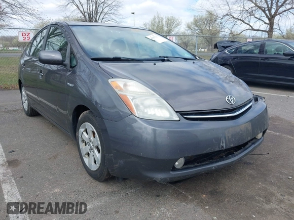 2007 Toyota Prius z VIN JTDKB20U073266399, wystawiony jako IAAI lot #41947176 z przebiegiem 186 258 mil mil oraz . Historia ofert i sprzedaży dostępna na DreamBid. Obrazek 1.
