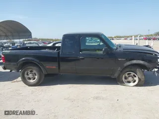 2003 Ford Ranger XL Fleet with VIN 1FTZR45E23PA81801, listed as a IAAI auction lot 41825231 with 105,092 mi miles. Bid and sale history available at carsss.com. Image 13.
