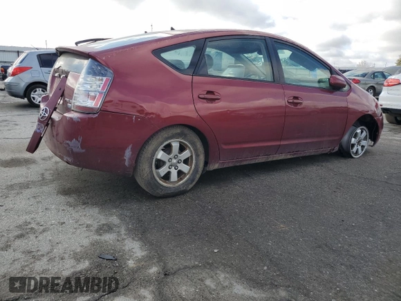 2004 Toyota Prius with VIN JTDKB20U240017969, listed as a Copart auction lot 89409555 with 215,305 mi miles and Salvage Title. Bid and sale history available at carsss.com. Image 3.