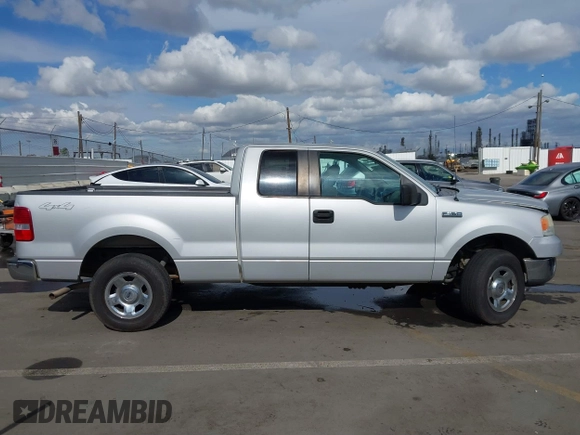 2007 Ford F-150 STX with VIN 1FTRX14W87KC40659, listed as a IAAI auction lot 41423345 with 145,811 mi miles. Bid and sale history available at carsss.com. Image 13.