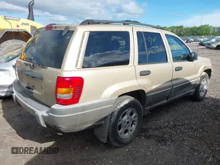 2000 Jeep Grand Cherokee Laredo with VIN 1J4GW48S3YC347711, listed as a IAAI auction lot 42305308 with Not provided miles and . Bid and sale history available at DreamBid. Image 4.